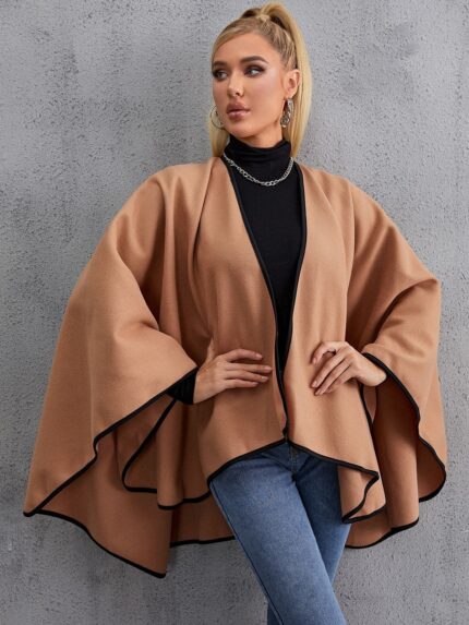 Wool poncho with leather